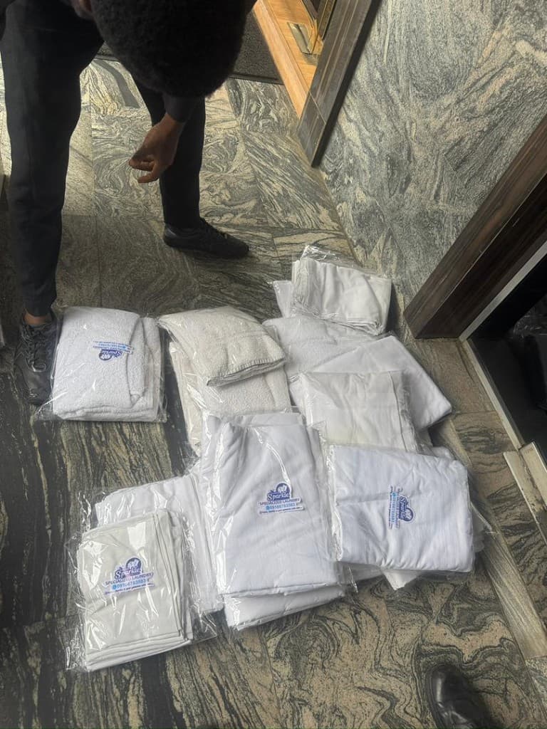 Bulk packaged white linens prepared for commercial clients