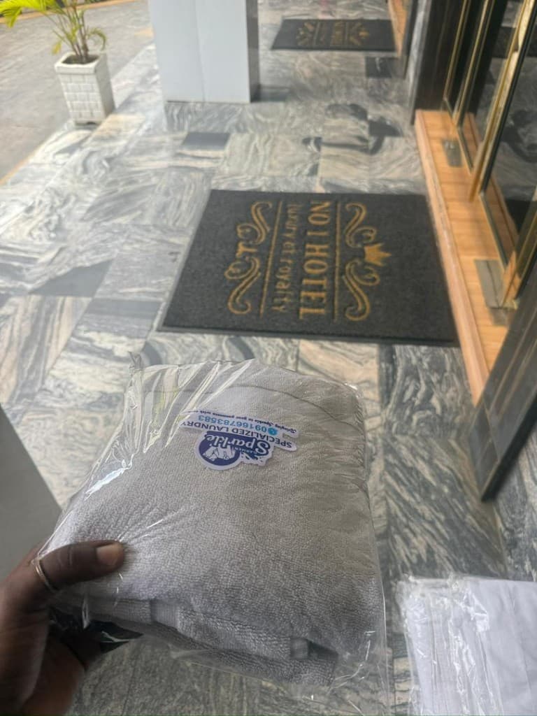 Garment Sparkle packaged laundry delivered to a customer door
